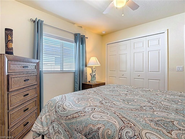 2103 SW 26th Ter, Cape Coral, FL 33914 - bedroom with a closet and a ceiling fan