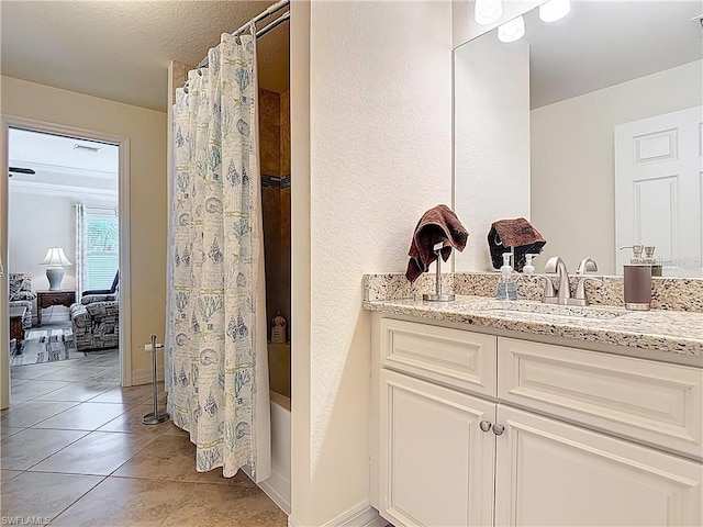 2103 SW 26th Ter, Cape Coral, FL 33914 - full bath with vanity, shower / bathtub combination with curtain, and tile patterned floors