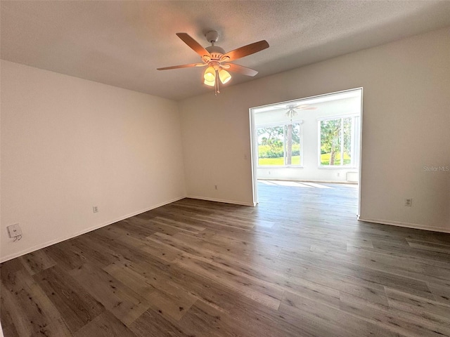 2459 Columbia Dr Unit 39, Clearwater, FL 33763 - empty room with dark wood-type flooring and ceiling fan