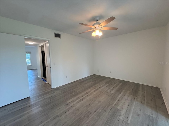 2459 Columbia Dr Unit 39, Clearwater, FL 33763 - unfurnished room featuring a ceiling fan and wood finished floors