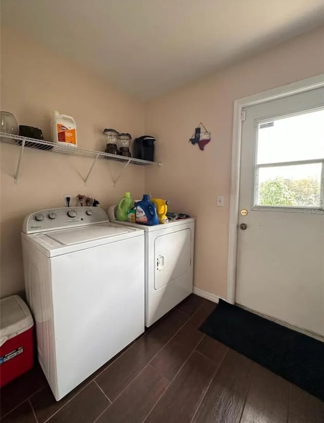 2014 Nancy Ave, Lutz, FL 33548 - washroom featuring independent washer and dryer and dark wood-style flooring