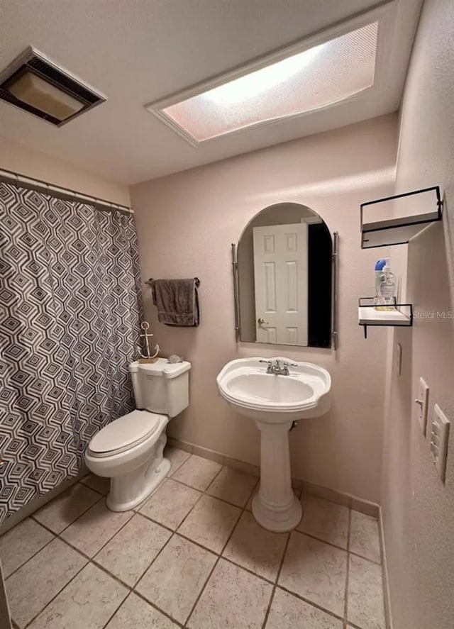 2014 Nancy Ave, Lutz, FL 33548 - full bath with toilet and tile patterned flooring