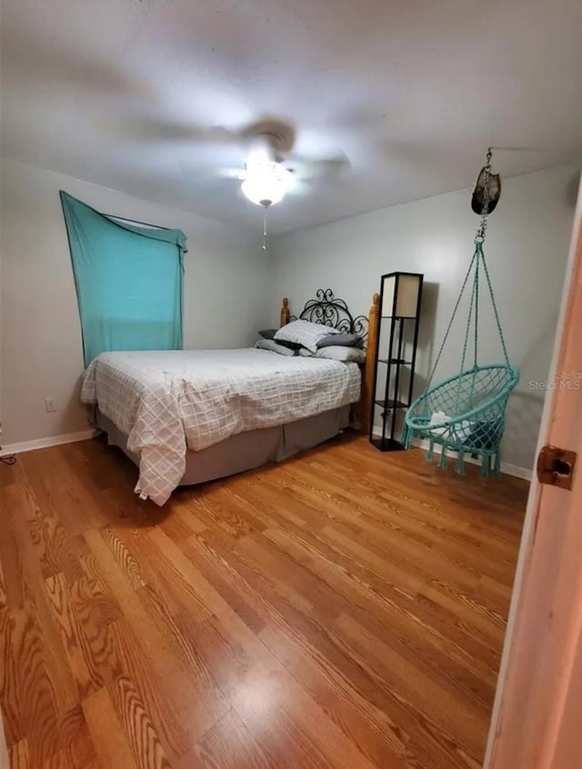 2014 Nancy Ave, Lutz, FL 33548 - bedroom featuring wood finished floors and ceiling fan