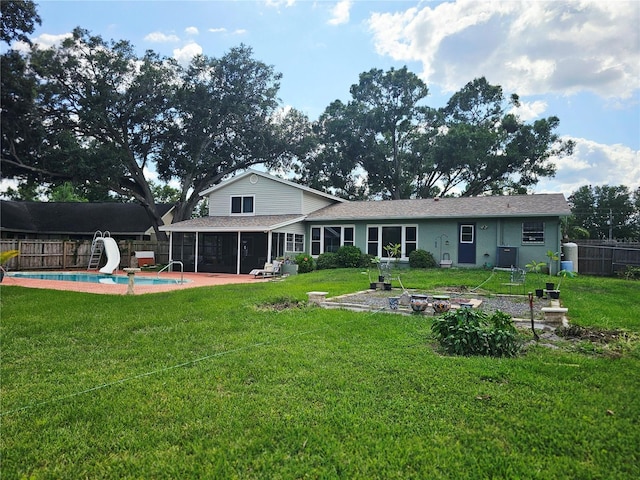 2014 Nancy Ave, Lutz, FL 33548 - rear view of house with a sunroom