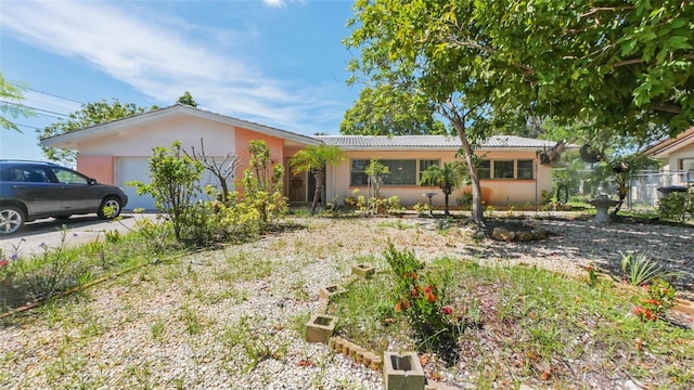 4720 Coronado Way S, Gulfport, FL 33711 - single story home featuring an attached garage and stucco siding