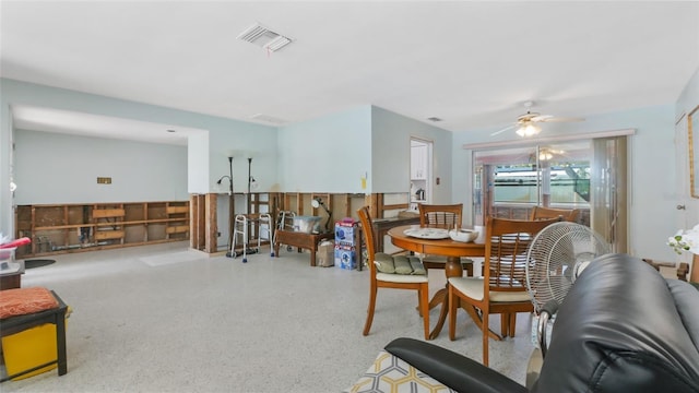 4720 Coronado Way S, Gulfport, FL 33711 - dining space with speckle patterned floor and ceiling fan
