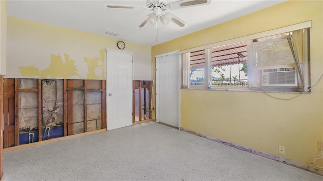 4720 Coronado Way S, Gulfport, FL 33711 - spare room with speckle patterned floor, ceiling fan, and cooling unit