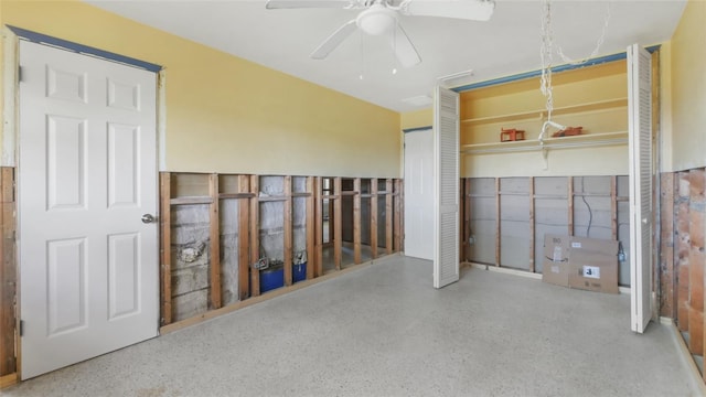 4720 Coronado Way S, Gulfport, FL 33711 - unfurnished bedroom with speckle patterned floor and ceiling fan