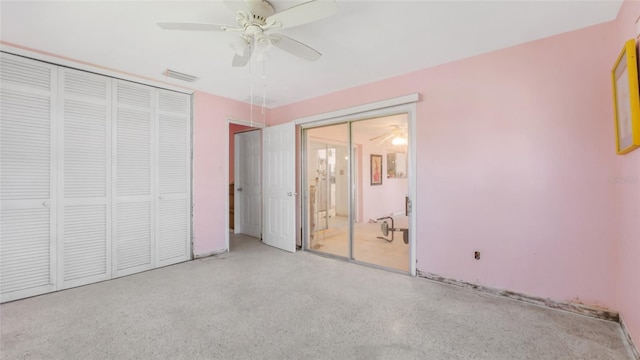 4720 Coronado Way S, Gulfport, FL 33711 - unfurnished bedroom with speckle patterned floor, a closet, and ceiling fan