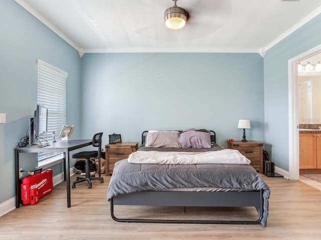 4503 Legacy Park Dr, Tampa, FL 33611 - bedroom featuring ornamental molding, a desk, light wood-style flooring, ensuite bathroom, and vaulted ceiling
