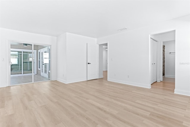 12106 Clearbrook Ct, Riverview, FL 33569 - empty room with light wood-style floors and ceiling fan