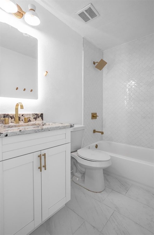 12106 Clearbrook Ct, Riverview, FL 33569 - full bathroom featuring vanity, washtub / shower combination, and marble finish flooring