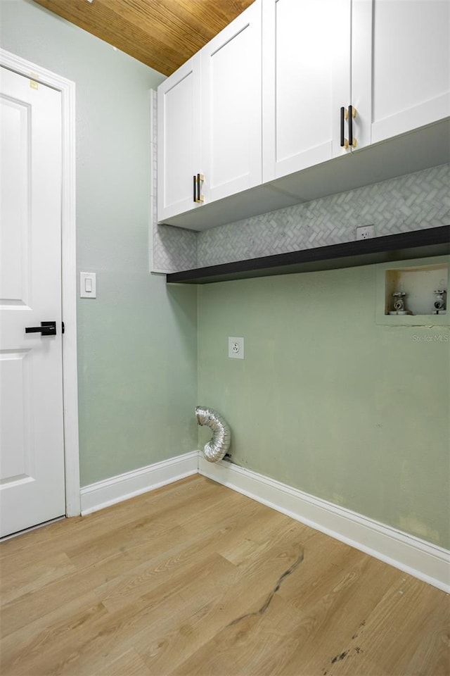 12106 Clearbrook Ct, Riverview, FL 33569 - laundry area featuring cabinet space, light wood-style flooring, hookup for a washing machine, and wood ceiling