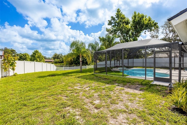 12106 Clearbrook Ct, Riverview, FL 33569 - fenced backyard with a lanai
