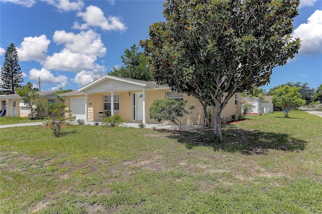 3707 Cambridge St, New Port Richey, FL 34652 - ranch-style home with a garage, a front yard, covered porch, and driveway