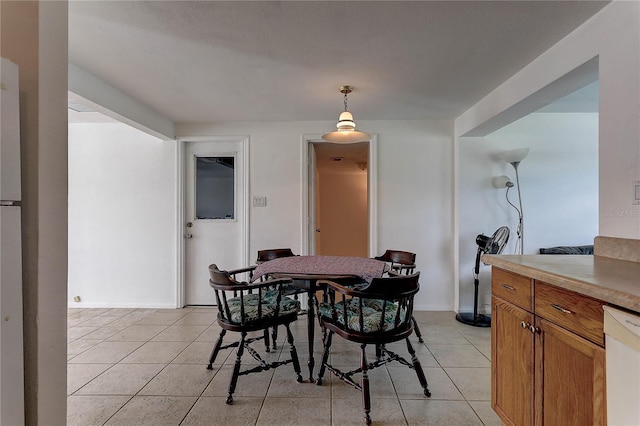 3707 Cambridge St, New Port Richey, FL 34652 - dining area with light tile patterned floors