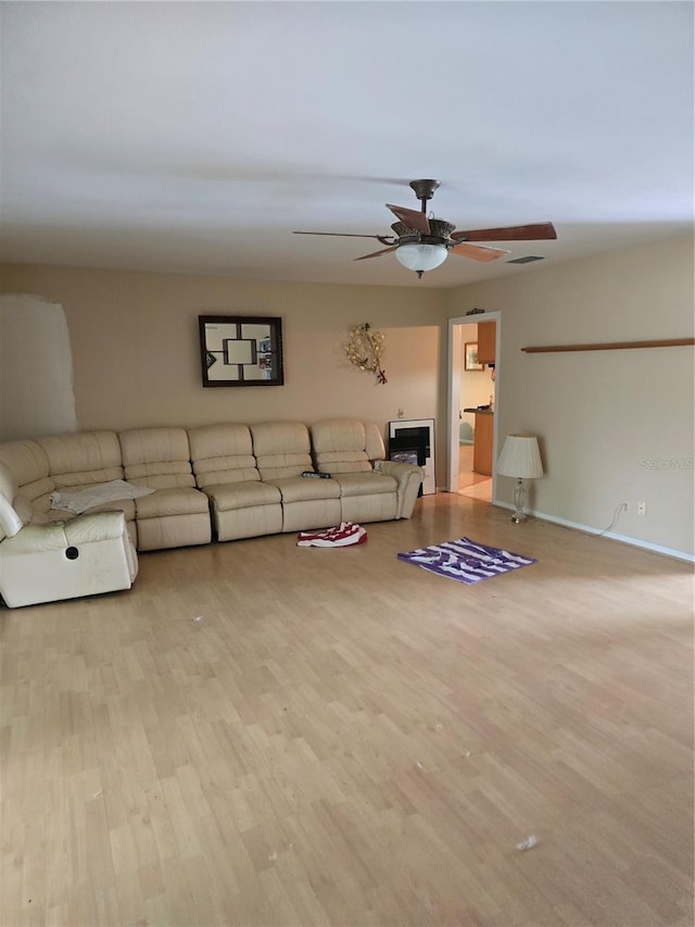 534 N Larry Cir, Brandon, FL 33511 - unfurnished living room featuring ceiling fan and wood finished floors