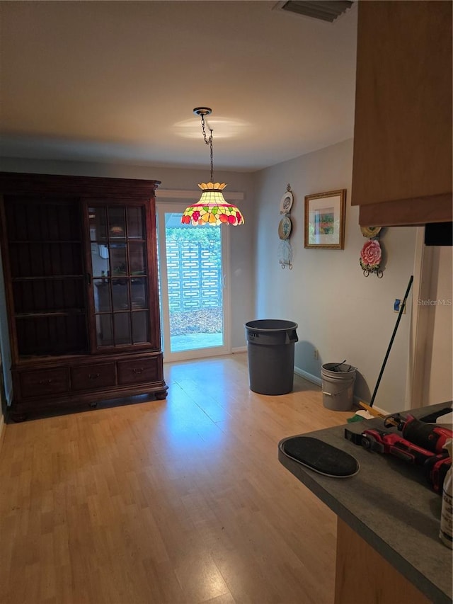 534 N Larry Cir, Brandon, FL 33511 - dining room with light wood finished floors and baseboards