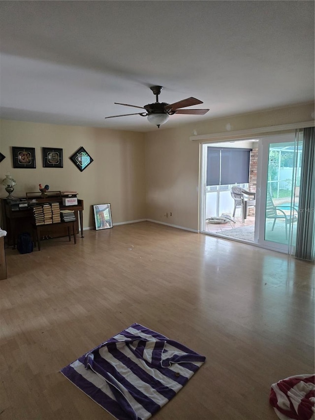 534 N Larry Cir, Brandon, FL 33511 - unfurnished living room featuring wood finished floors and a ceiling fan