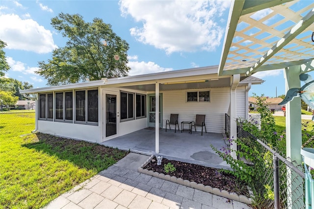 8851 SW 116th Street Rd, Ocala, FL 34481 - back of house featuring a sunroom