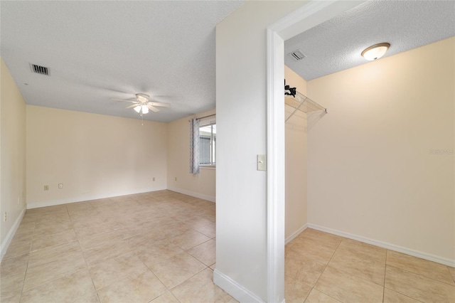 8851 SW 116th Street Rd, Ocala, FL 34481 - walk in closet with ceiling fan and light tile patterned floors