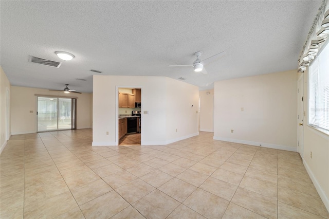 8851 SW 116th Street Rd, Ocala, FL 34481 - unfurnished room featuring a ceiling fan, light tile patterned floors, and a textured ceiling