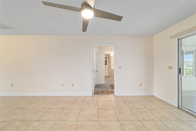 8851 SW 116th Street Rd, Ocala, FL 34481 - unfurnished room featuring ceiling fan, light tile patterned floors, and a textured ceiling