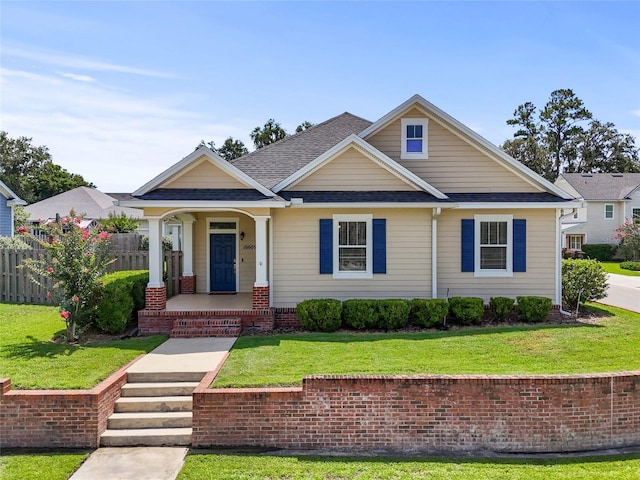 16609 NW 166th Dr, Alachua, FL 32615 - view of front of home featuring covered porch and roof with shingles
