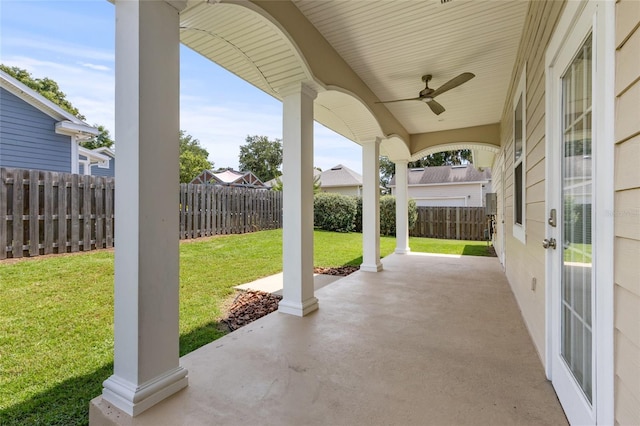 16609 NW 166th Dr, Alachua, FL 32615 - fenced backyard featuring ceiling fan and a patio area