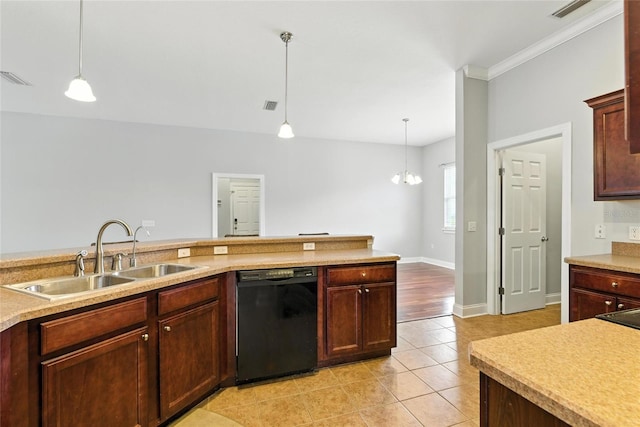 16609 NW 166th Dr, Alachua, FL 32615 - kitchen featuring black dishwasher, hanging light fixtures, light countertops, light tile patterned flooring, and ornamental molding