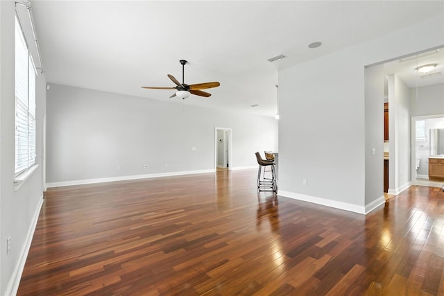 16609 NW 166th Dr, Alachua, FL 32615 - empty room featuring ceiling fan, wood finished floors, and healthy amount of natural light