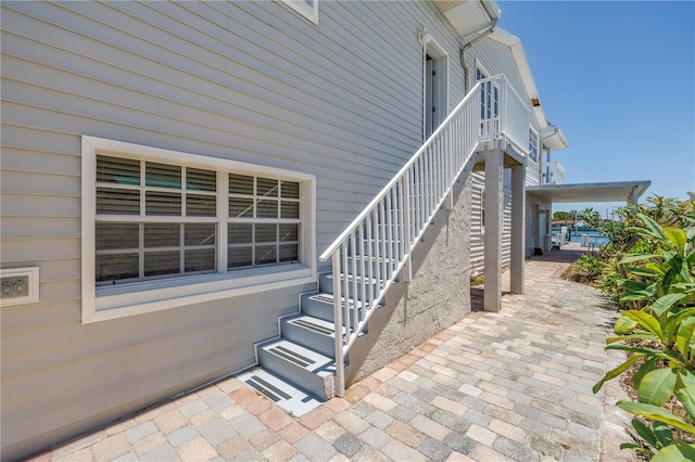 340 Bay Plz, Treasure Island, FL 33706 - view of patio / terrace featuring stairway