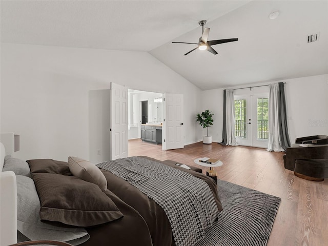 2812 Windcrest Oaks Ct, Valrico, FL 33594 - bedroom with access to exterior, wood finished floors, a ceiling fan, high vaulted ceiling, and french doors