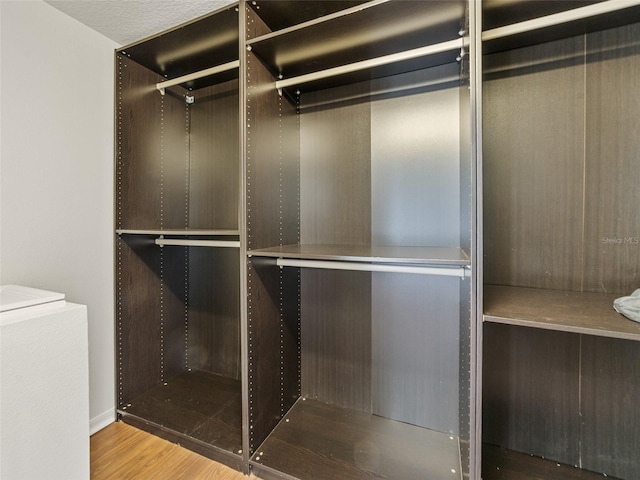 2812 Windcrest Oaks Ct, Valrico, FL 33594 - spacious closet with wood finished floors
