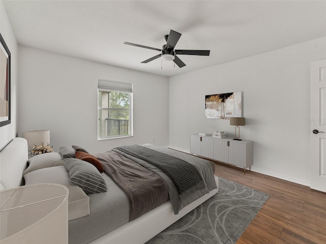 2812 Windcrest Oaks Ct, Valrico, FL 33594 - bedroom featuring wood finished floors and ceiling fan