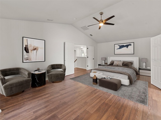 2812 Windcrest Oaks Ct, Valrico, FL 33594 - bedroom featuring lofted ceiling, wood finished floors, and a ceiling fan
