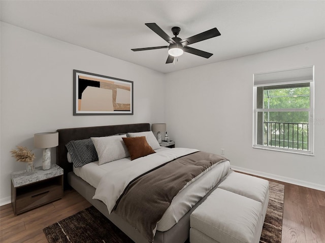 2812 Windcrest Oaks Ct, Valrico, FL 33594 - bedroom featuring wood finished floors and a ceiling fan