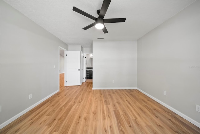 4639 Cabbage Palm Dr, Valrico, FL 33596 - unfurnished room featuring light wood-style floors and a ceiling fan
