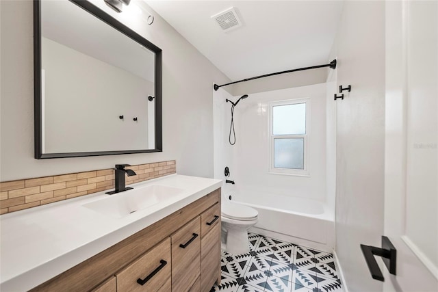 4639 Cabbage Palm Dr, Valrico, FL 33596 - bathroom featuring vanity, shower / bathtub combination, tasteful backsplash, and tile patterned flooring