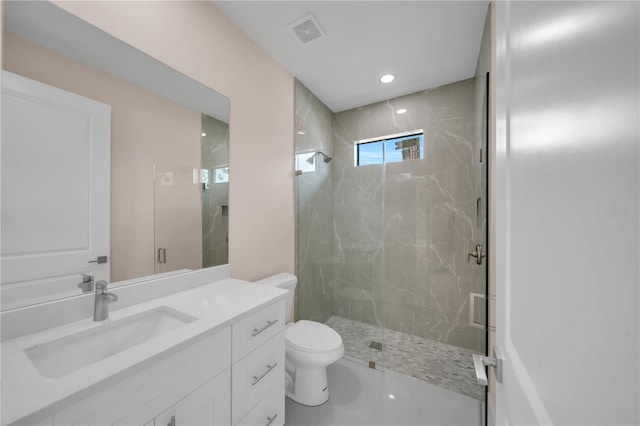 2606 34th St SW, Lehigh Acres, FL 33976 - full bathroom with vanity, a marble finish shower, and recessed lighting