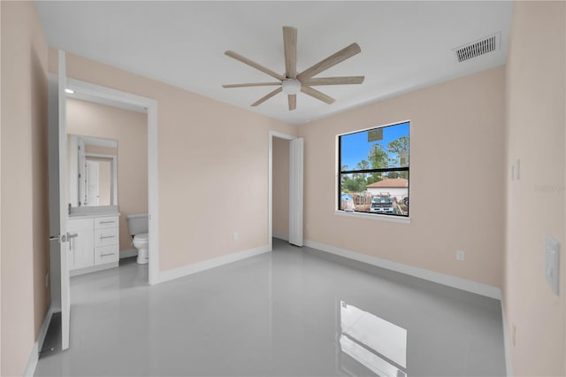 2606 34th St SW, Lehigh Acres, FL 33976 - unfurnished room featuring ceiling fan and baseboards