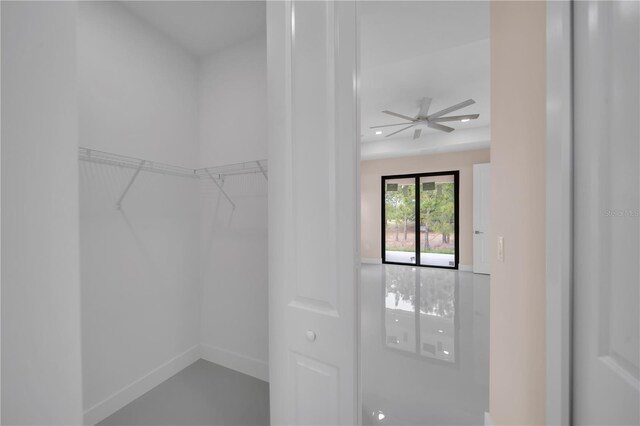 2606 34th St SW, Lehigh Acres, FL 33976 - spacious closet featuring ceiling fan