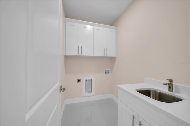 2606 34th St SW, Lehigh Acres, FL 33976 - laundry room featuring hookup for an electric dryer, washer hookup, and cabinet space