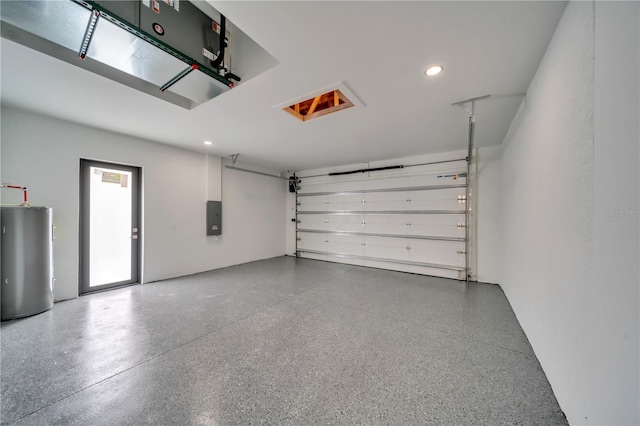 2606 34th St SW, Lehigh Acres, FL 33976 - garage featuring water heater, electric panel, and recessed lighting