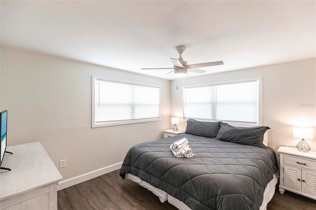 6020 Midnight Pass Rd Unit 49, Sarasota, FL 34242 - bedroom featuring dark wood finished floors and ceiling fan