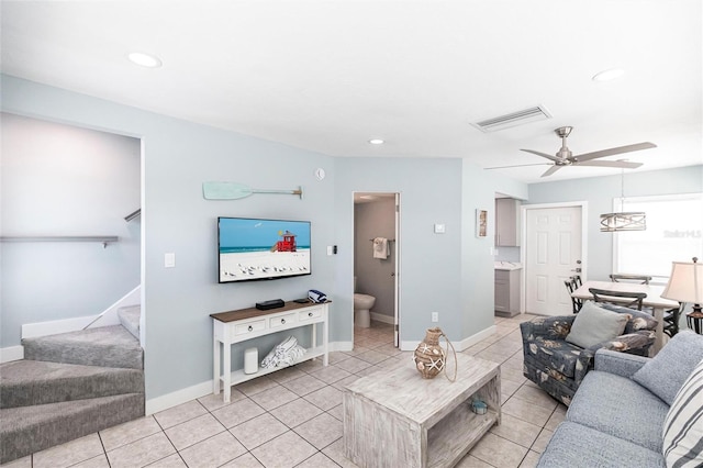 6020 Midnight Pass Rd Unit 49, Sarasota, FL 34242 - living area with a ceiling fan, light tile patterned flooring, stairs, and recessed lighting
