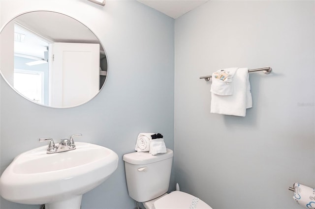 6020 Midnight Pass Rd Unit 49, Sarasota, FL 34242 - bathroom with a sink and toilet