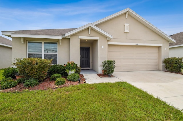 4119 Autumn Amber Dr, Spring Hill, FL 34609 - view of front of property featuring an attached garage, driveway, stucco siding, and a front yard