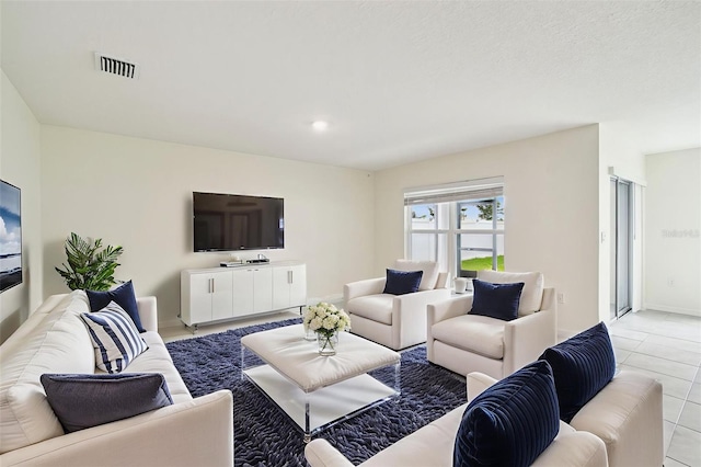 4119 Autumn Amber Dr, Spring Hill, FL 34609 - living area featuring light tile patterned floors