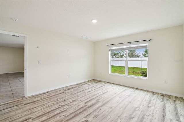 4119 Autumn Amber Dr, Spring Hill, FL 34609 - empty room featuring wood finished floors, a smoke detector, and recessed lighting